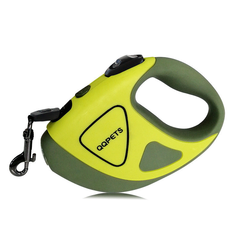 A hand holding a retractable dog leash with an LED shining button, predominantly black and white in color.