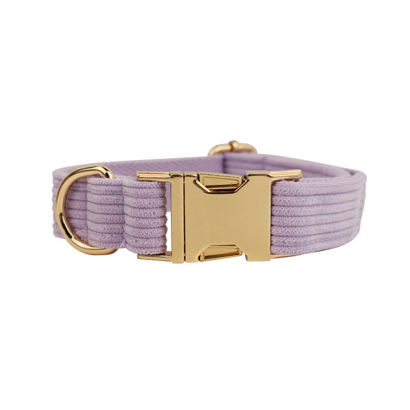 A set of dog pet accessories including a collar, leash, bow, flower decoration, and a vest, all in green with a gold leaf pattern.