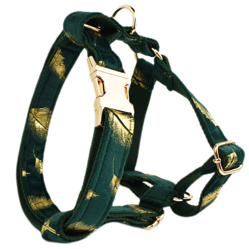 A set of dog pet accessories including a collar, leash, bow, flower decoration, and a vest, all in green with a gold leaf pattern.