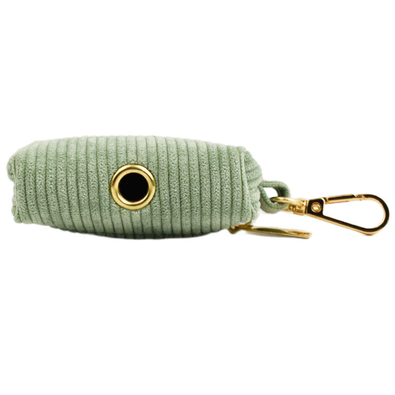 A set of dog pet accessories including a collar, leash, bow, flower decoration, and a vest, all in green with a gold leaf pattern.