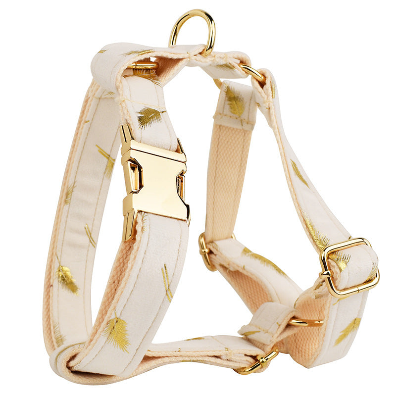 A set of dog pet accessories including a collar, leash, bow, flower decoration, and a vest, all in green with a gold leaf pattern.